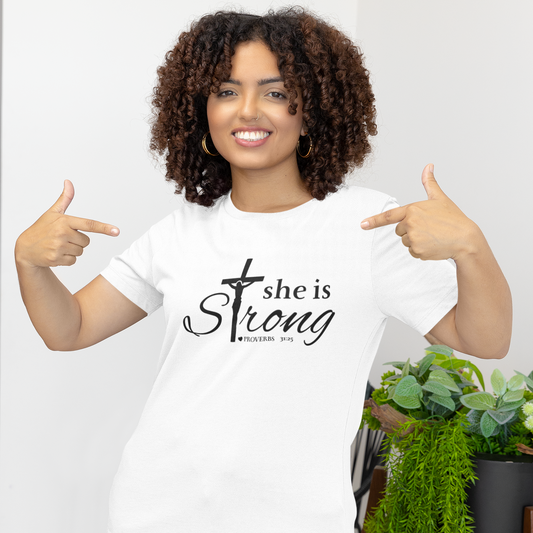 She Is Strong Christian T-shirt with minimalist cross typography design by Witness Brand